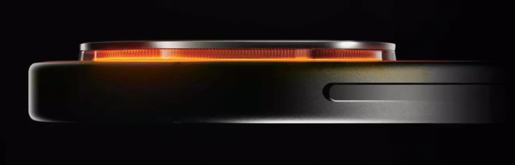 Close-up side view of Vivo iQOO 15 camera module with glowing orange ring light around the lens, showcasing premium design and detailing.