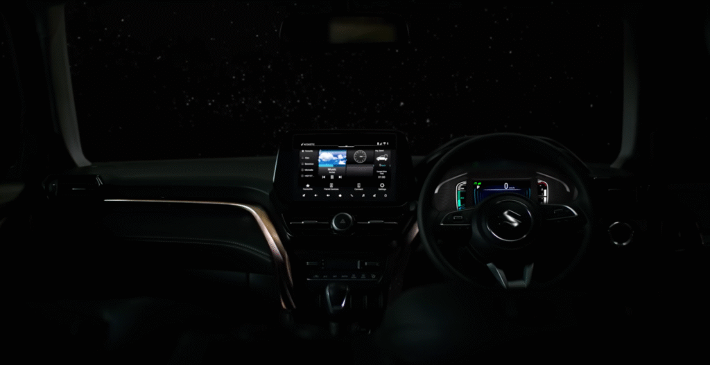 Grand Vitara Phantom Blaq Edition interior with touchscreen and gold-accented black dashboard.